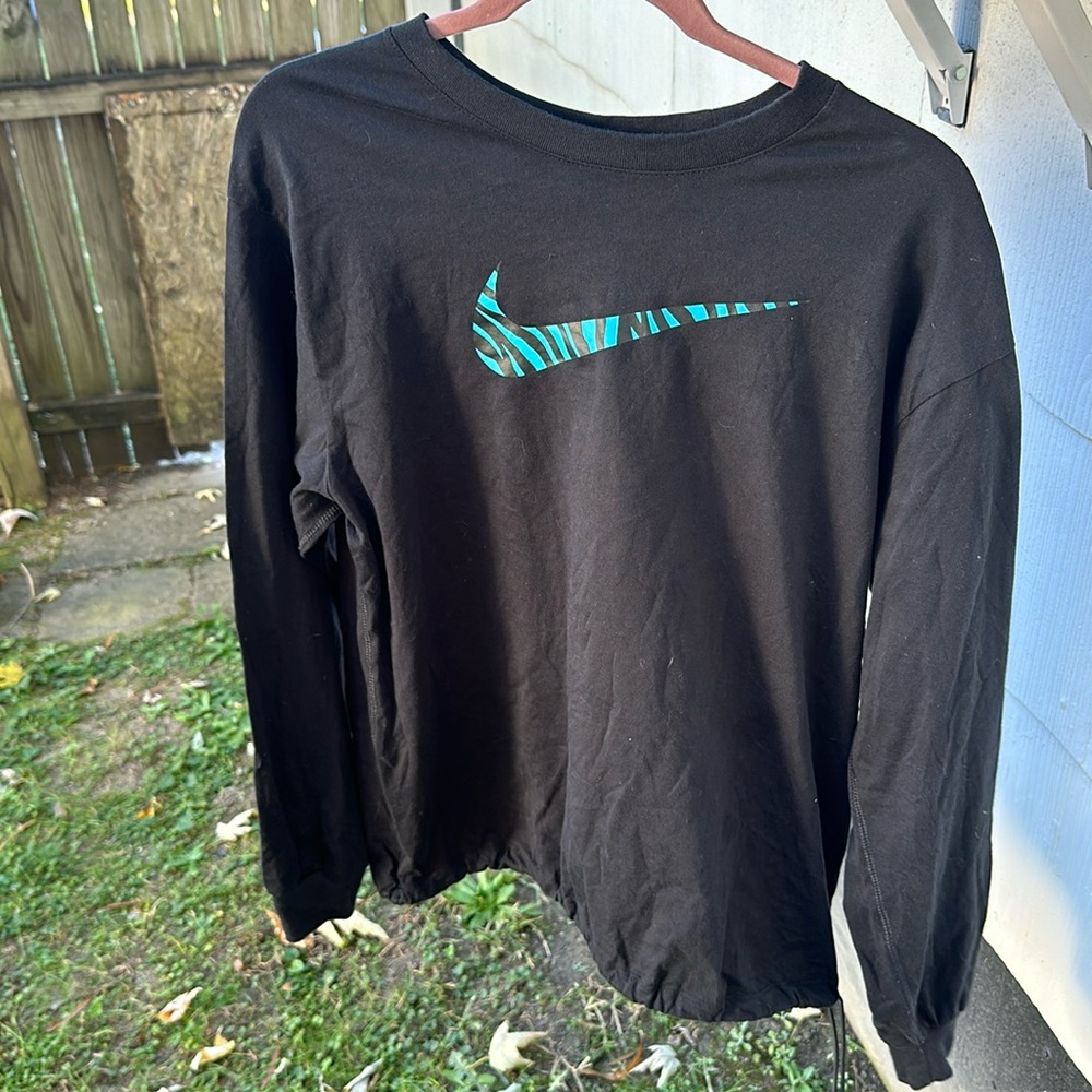 Nike black long sleeve with Nike blue zebra logo